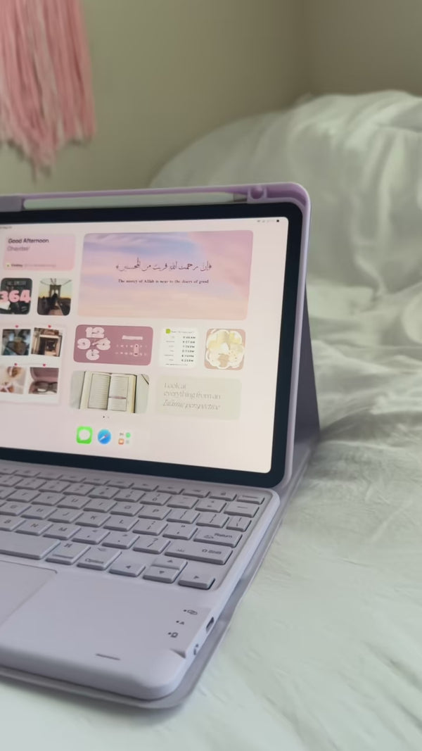 Creator turning an iPad into a laptop-style setup with the CHESONA Step purple keyboard case for typing and everyday productivity.
