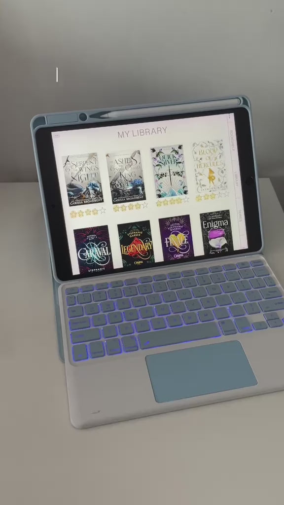 Creator using the CHESONA Step blue iPad keyboard case with backlit keys for reading, note-taking, browsing, and study.